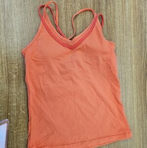 Set Orange Strappy Tank Top And Leggings For Fitness Exercise